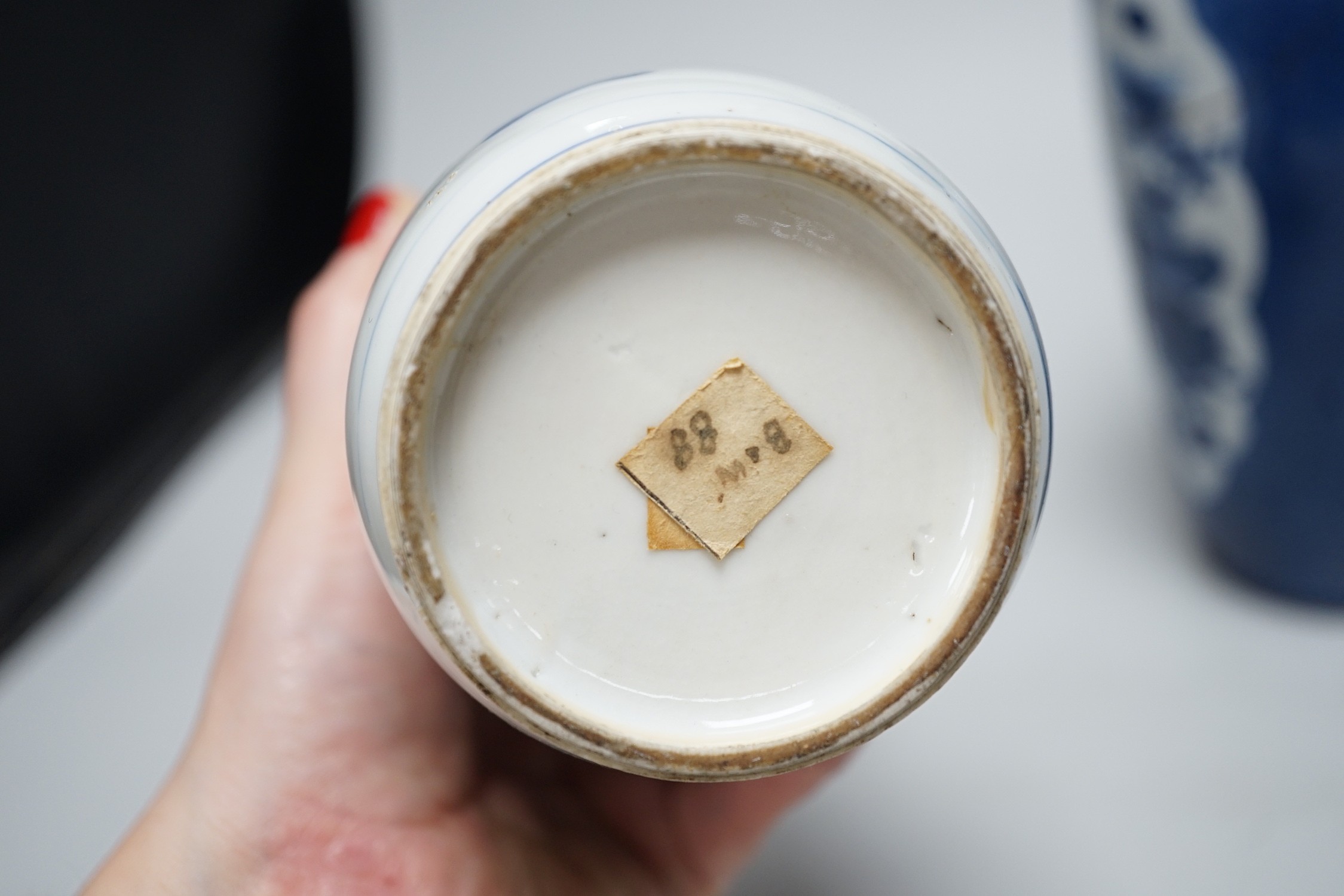 A Chinese blue and white ‘precious objects’ export vase, together with a Chinese powder blue export vase, open vignettes (a.f.) tallest 24.5cms